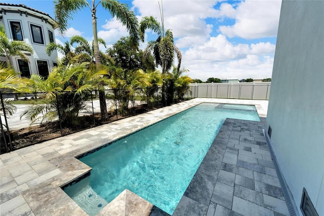 view of swimming pool featuring a patio