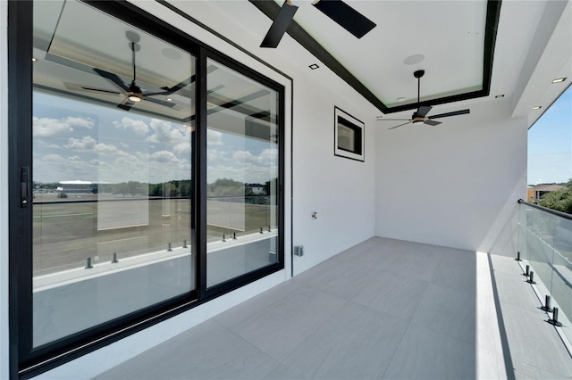 balcony featuring ceiling fan