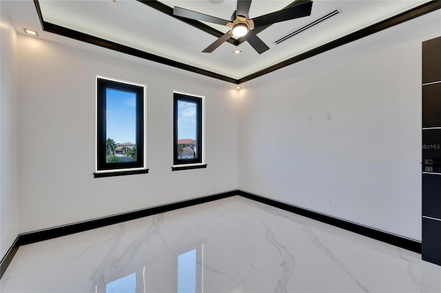 unfurnished room with ceiling fan and ornamental molding