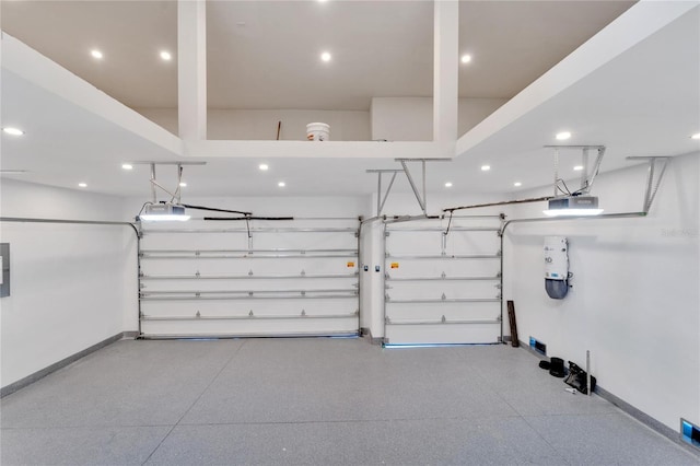 garage with a garage door opener and electric panel