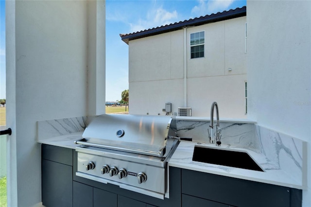 view of patio / terrace featuring sink and area for grilling