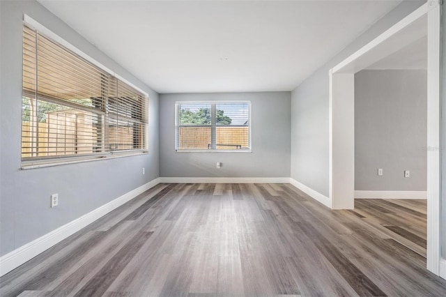 empty room featuring hardwood / wood-style floors