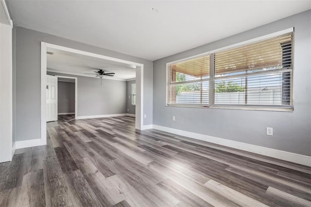 spare room with ceiling fan and hardwood / wood-style floors