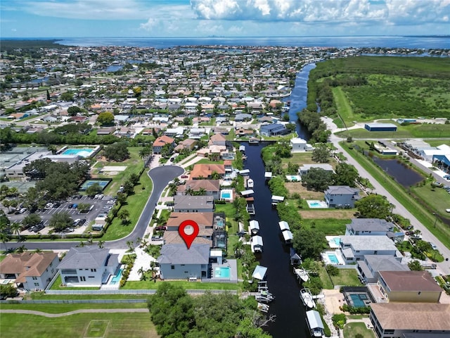 bird's eye view with a water view