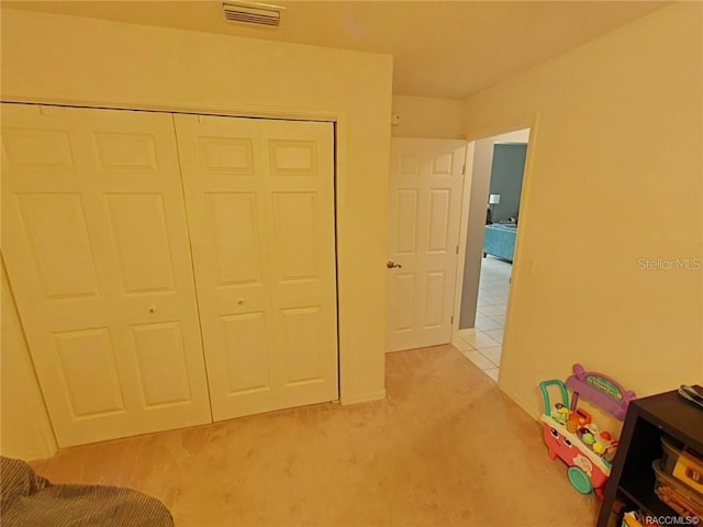 1874 W Pearson St, Hernando, FL 34442 - unfurnished bedroom with light carpet and a closet