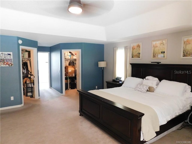 1874 W Pearson St, Hernando, FL 34442 - carpeted bedroom with a walk in closet, a closet, and ceiling fan
