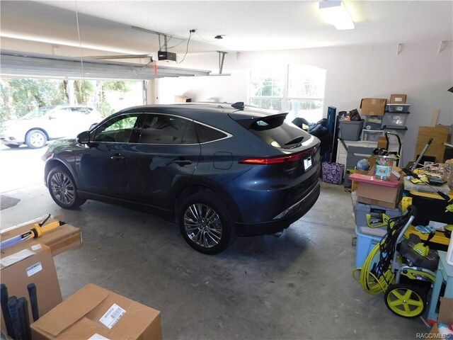 1874 W Pearson St, Hernando, FL 34442 - garage featuring a garage door opener
