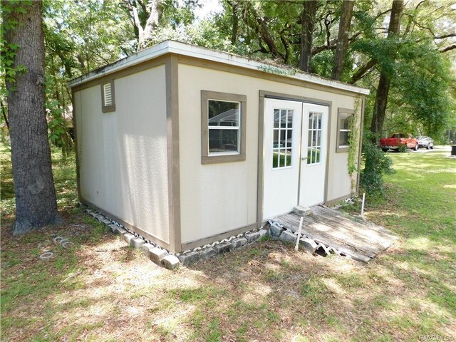 1874 W Pearson St, Hernando, FL 34442 - view of outdoor structure featuring a lawn