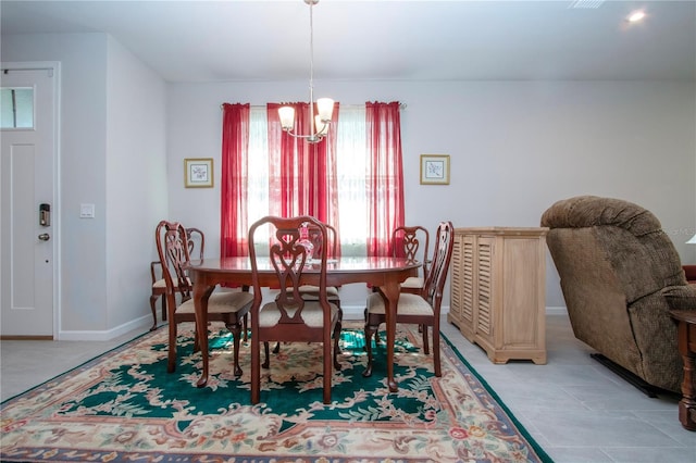 dining area with a chandelier