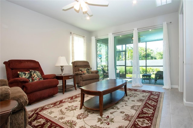 sitting room with ceiling fan