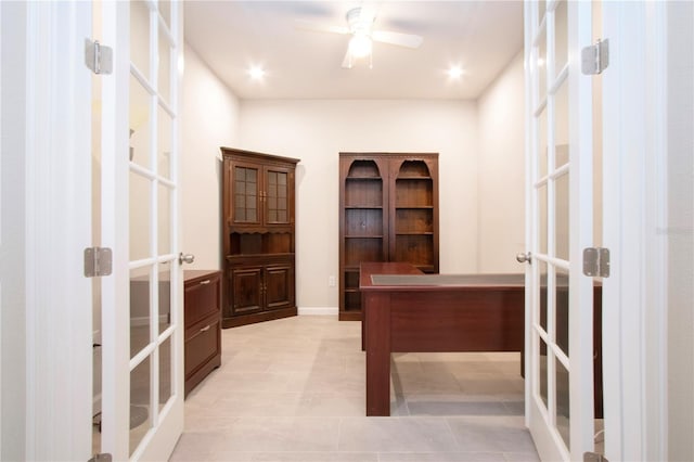 home office with ceiling fan, light tile patterned floors, and french doors