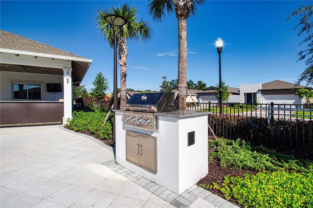 view of patio with a grill and area for grilling