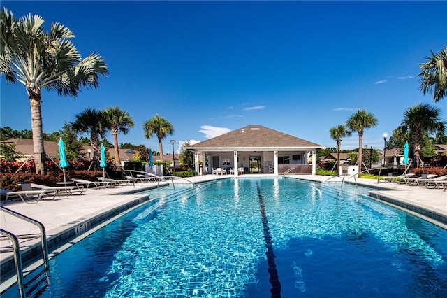 view of pool featuring a patio