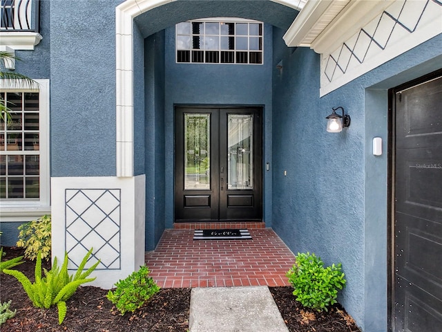 view of exterior entry with french doors