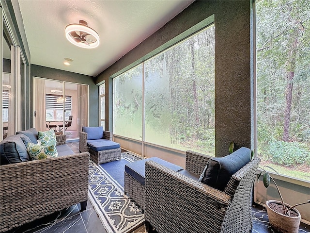 sunroom featuring a wealth of natural light