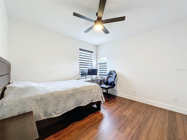 bedroom with wood-type flooring and ceiling fan