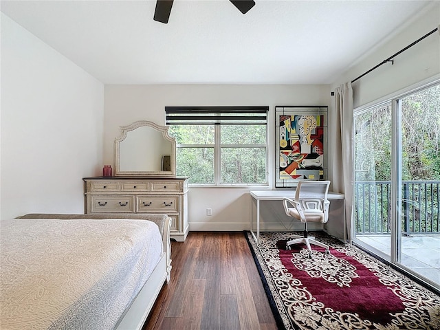 bedroom with access to exterior, multiple windows, ceiling fan, and dark wood-type flooring