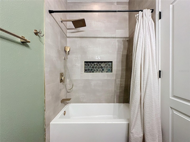 bathroom with shower / tub combo with curtain