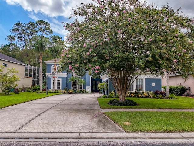 view of front of property with a front lawn