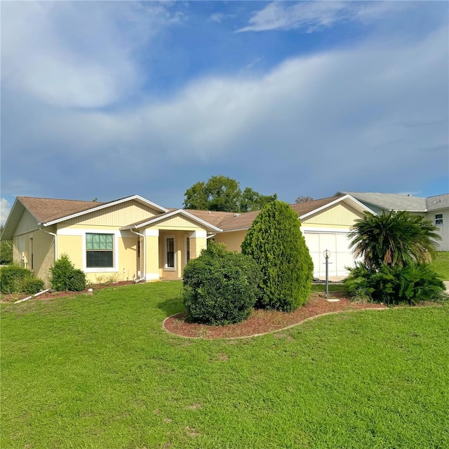 ranch-style home with a front yard