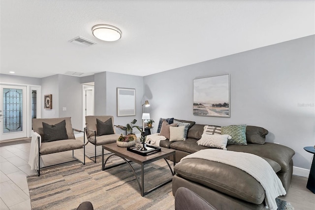 living room with light hardwood / wood-style floors