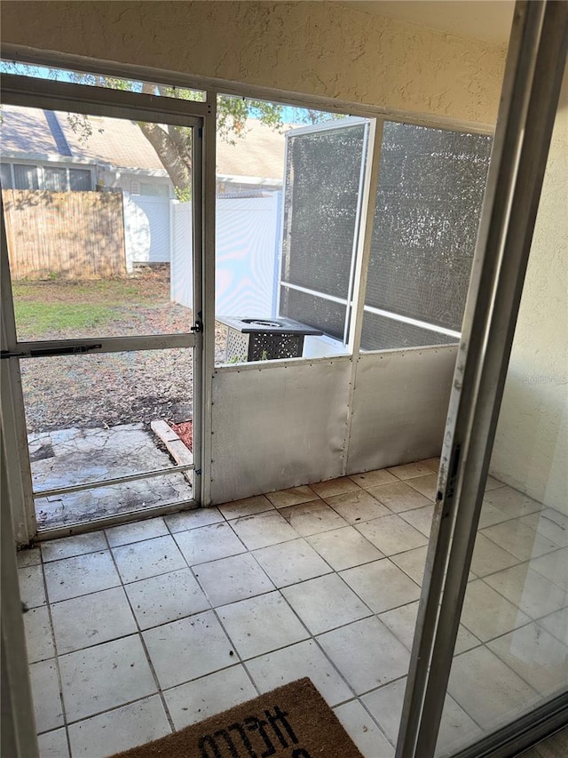 view of unfurnished sunroom