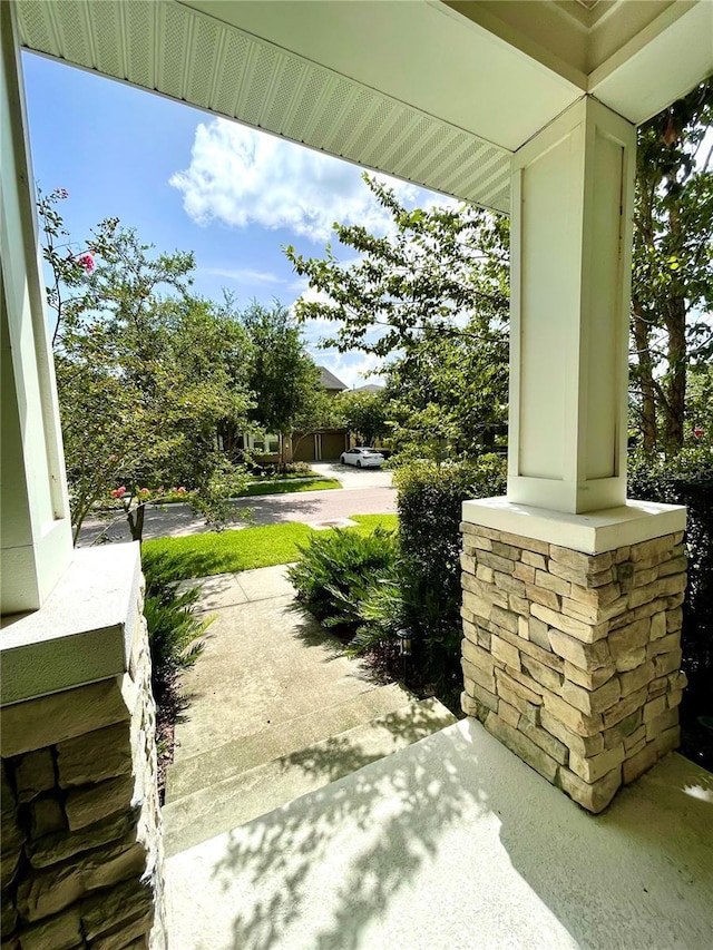 view of patio featuring a porch