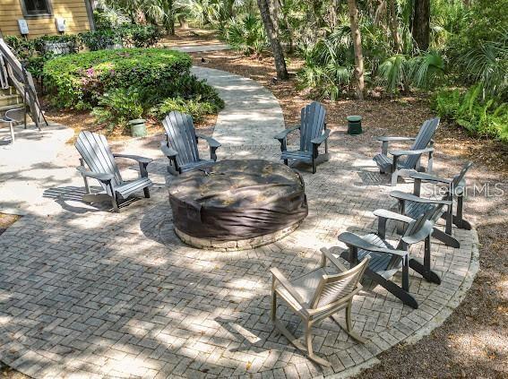 view of patio / terrace with a fire pit