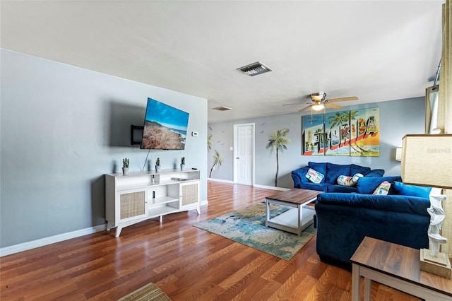 living room with ceiling fan and hardwood / wood-style floors