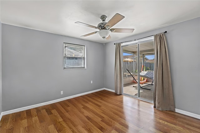 spare room featuring ceiling fan and wood-type flooring