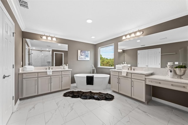 bathroom featuring ornamental molding, separate shower and tub, and vanity