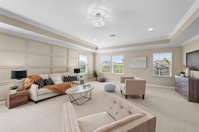 living room with light colored carpet, a raised ceiling, crown molding, and a chandelier