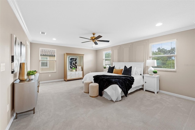 bedroom featuring light carpet, crown molding, baseboards, and visible vents