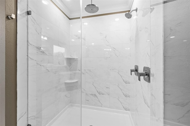 full bath featuring a shower stall and crown molding