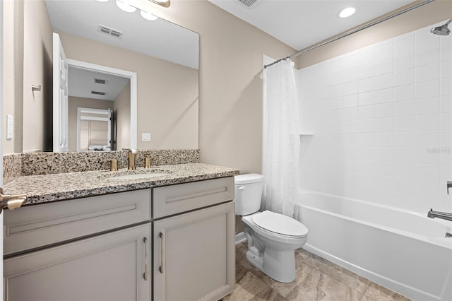 full bathroom featuring toilet, vanity, shower / tub combo with curtain, and visible vents