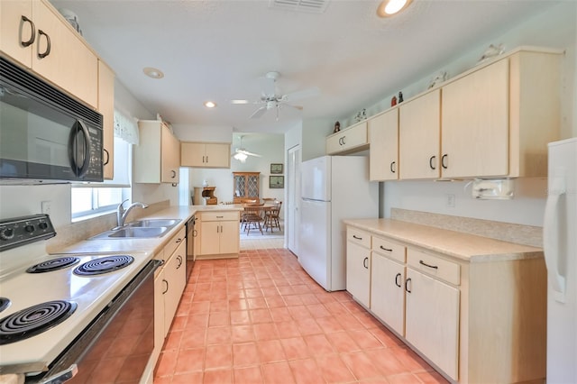 kitchen featuring ceiling fan, light brown cabinets, white appliances, sink, and light tile patterned floors