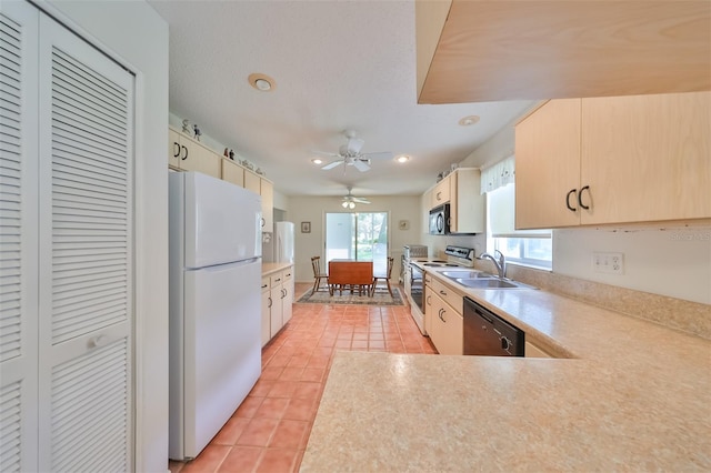 kitchen with light tile patterned floors, dishwasher, ceiling fan, range with electric stovetop, and white refrigerator