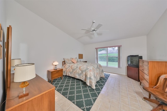 bedroom featuring light tile patterned flooring, ceiling fan, and lofted ceiling