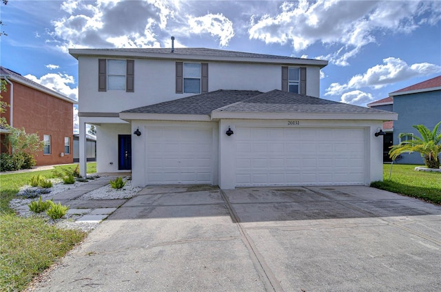 20131 Nob Oak Ave, Tampa, FL 33647 - traditional-style home featuring stucco siding, an attached garage, driveway, and a shingled roof