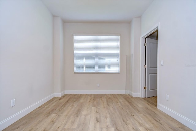20131 Nob Oak Ave, Tampa, FL 33647 - empty room with light wood-style floors and baseboards