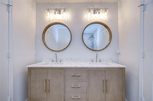 20131 Nob Oak Ave, Tampa, FL 33647 - bathroom featuring double vanity and a textured wall