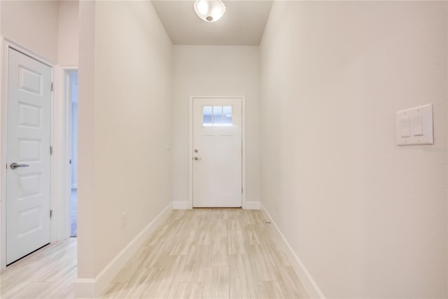 doorway with light hardwood / wood-style floors