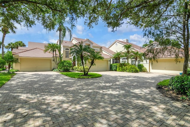 view of front of property with a garage