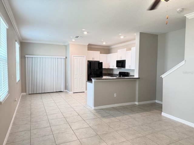 kitchen with white cabinetry, black appliances, ornamental molding, and kitchen peninsula