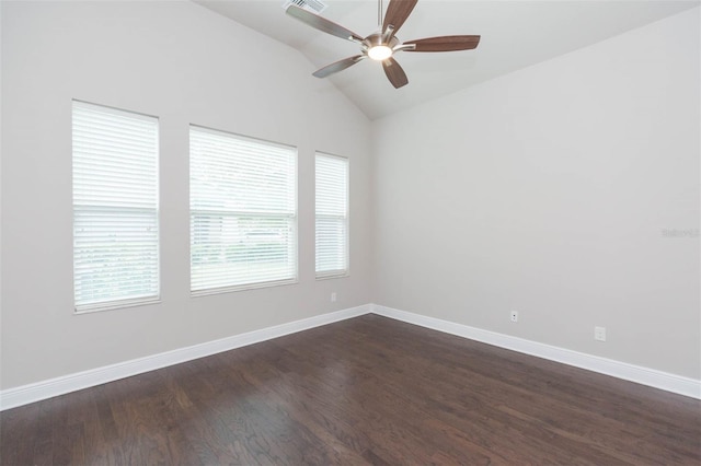 spare room with ceiling fan, dark hardwood / wood-style flooring, and lofted ceiling