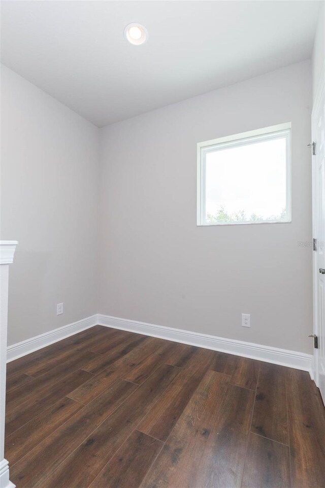 empty room featuring wood-type flooring