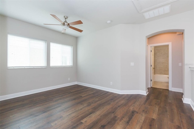 spare room with hardwood / wood-style flooring and ceiling fan