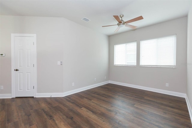 spare room featuring wood-type flooring, ceiling fan, and vaulted ceiling