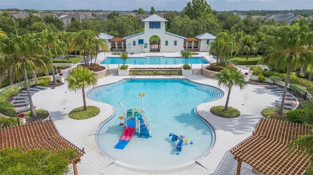 view of pool featuring a patio area