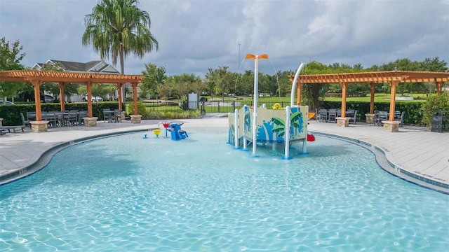 view of swimming pool with a pergola